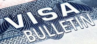 Visa bulletin chart on laptop